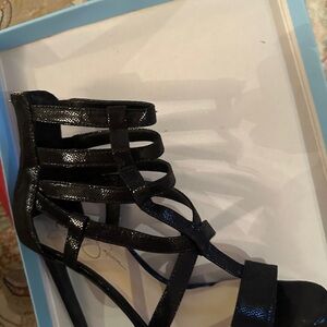 Black Heels with Crisscross Straps and Glossy Finish